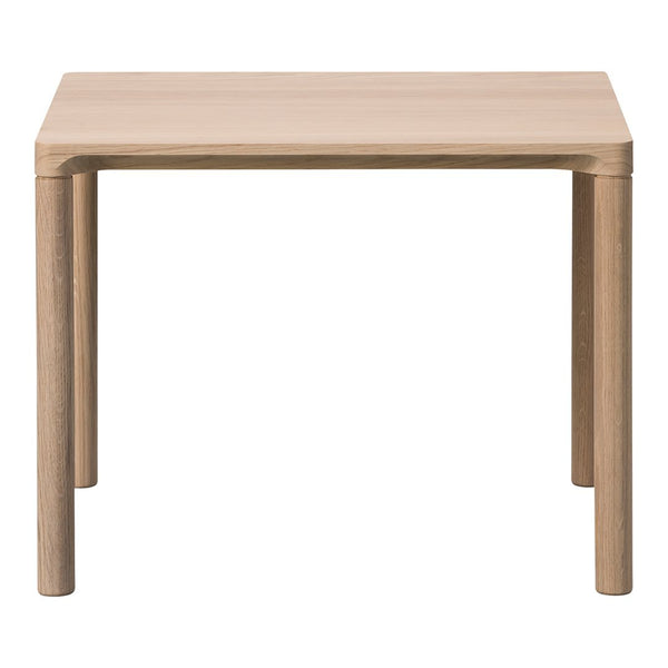 Light wood square table with a smooth finish and rounded corners. Neutral beige tones complement any decor.