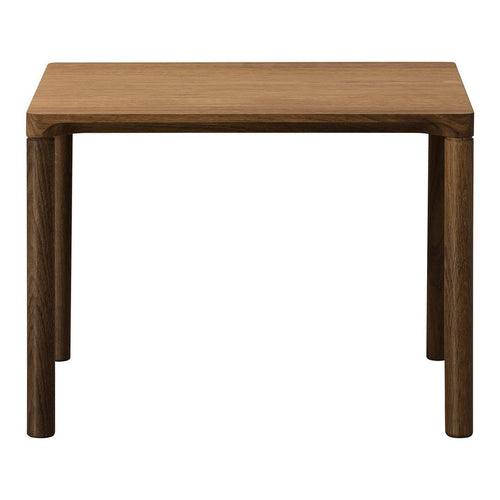 Natural wood table with a warm, light brown surface and dark brown legs, featuring a sleek, modern design.