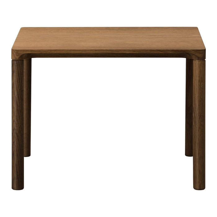 Natural wood table with a warm, light brown surface and dark brown legs, featuring a sleek, modern design.