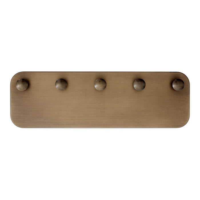 Brushed bronze wall hook rack with four rounded pegs on a smooth rectangular base. Elegant and modern design.