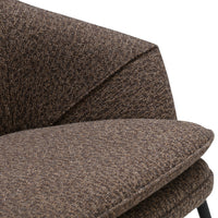 Brown textured upholstery with a subtle woven pattern, featuring a modern, angular design. Ideal for stylish decor.