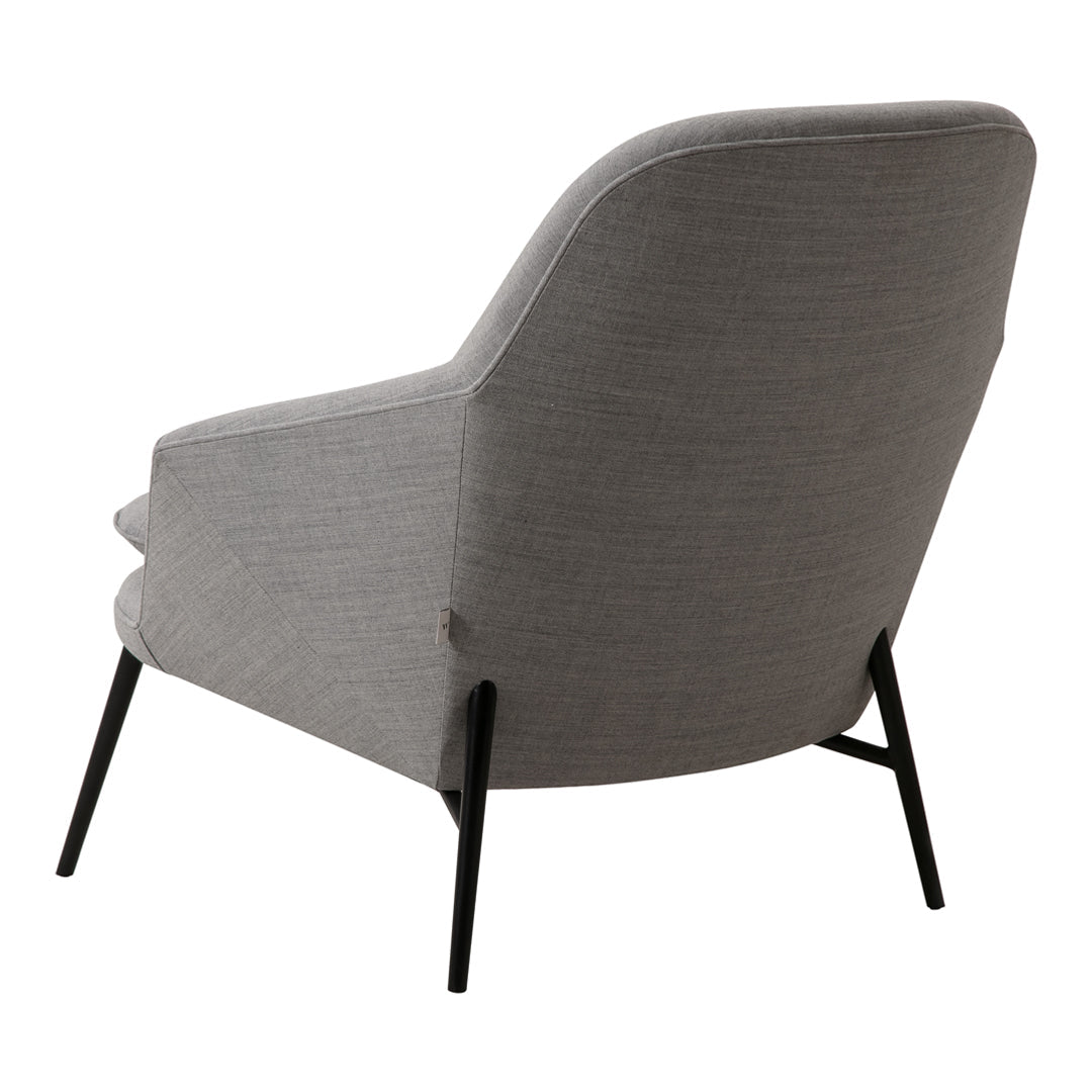 Gray upholstered accent chair with a textured fabric and sleek black legs, perfect for modern decor.