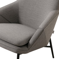 Gray upholstered chair with a minimalist design and textured fabric, featuring clean lines and a sleek black metal base.