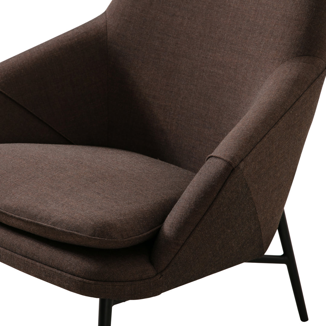 Brown textured fabric armchair with modern black metal legs, featuring clean lines and a minimalist design.
