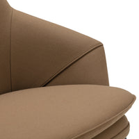 Brown upholstered chair with smooth, curved lines and a modern design. Soft, neutral tones suitable for various interiors.