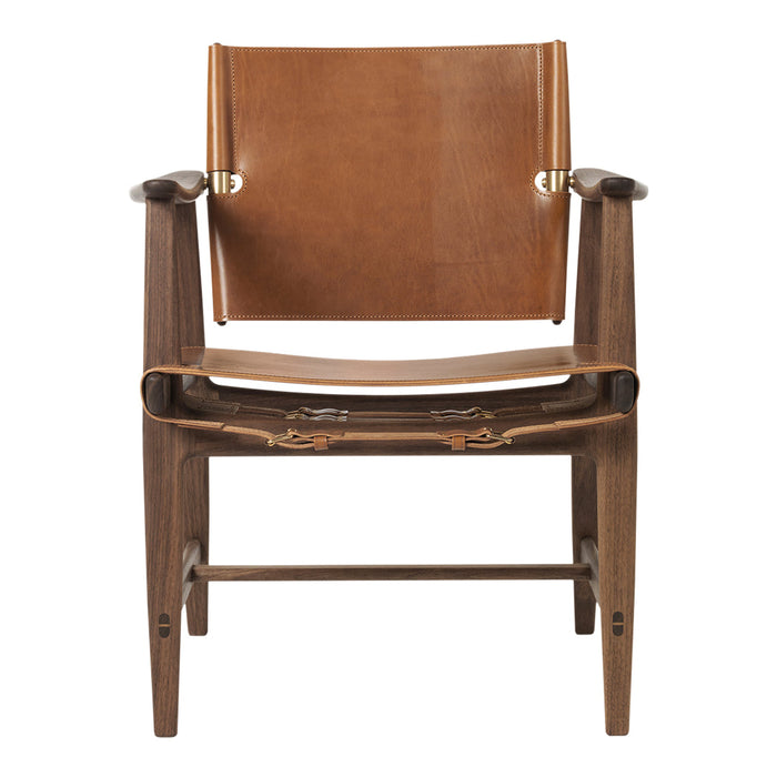 Brown leather and wood chair with a minimalist design and natural finish, featuring subtle, elegant stitching details.