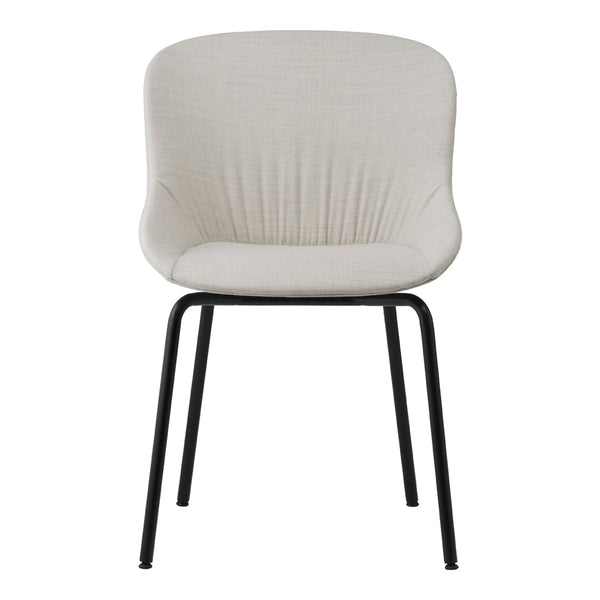 Beige upholstered chair with ribbed texture and sleek black metal legs. Stylish and versatile for modern decor.