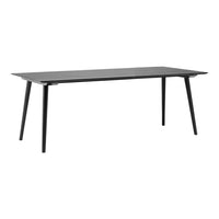 Sleek black rectangular table with a smooth finish and minimalist design, ideal for modern living spaces.