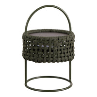 Green woven basket with intricate patterns, featuring a circular open frame and smooth grey base.