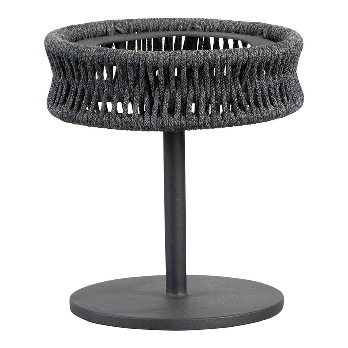 Black woven basket on a sleek black metal stand, featuring an intricate open pattern. Ideal for stylish storage solutions.