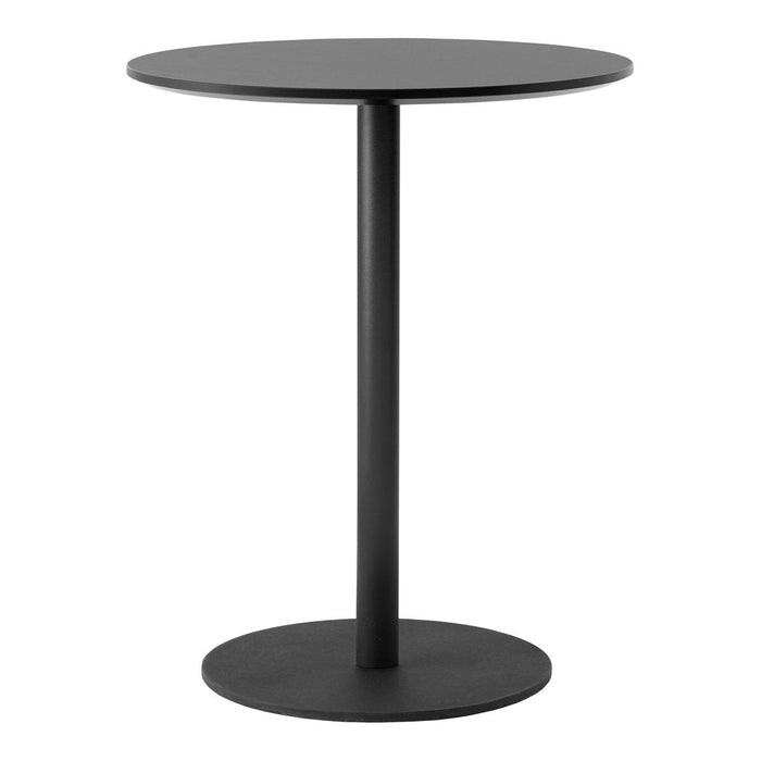 "Minimalist round black table with a sleek pedestal base, perfect for modern decor."