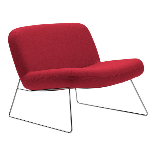 Red modern lounge chair with a sleek, minimalist design and chrome legs, perfect for contemporary decor.