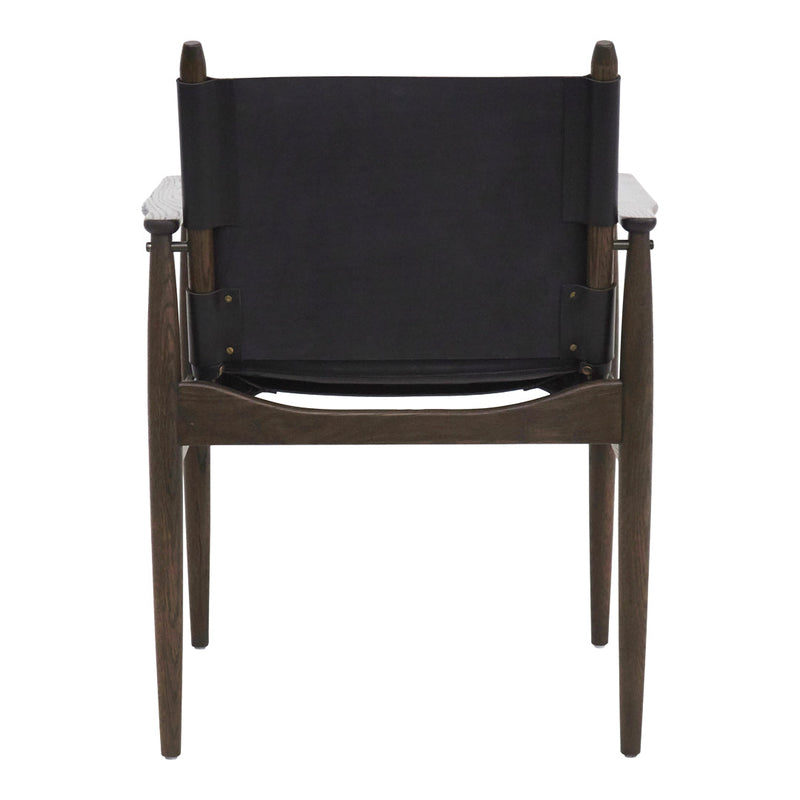 Black canvas chair with a dark wooden frame, showcasing a minimalist design and modern aesthetic.