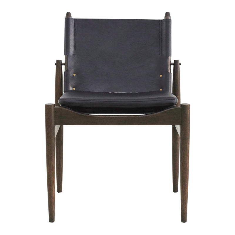 "Minimalist black leather chair with dark wooden frame and subtle gold accents, offering a modern aesthetic."