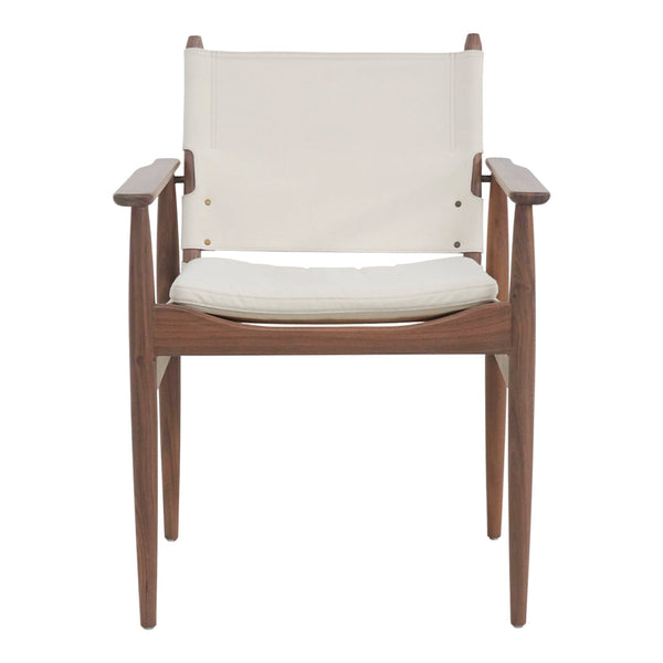 Cream-colored canvas chair with a warm walnut wood frame, highlighting a minimalist design aesthetic.