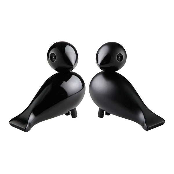 "Pair of sleek black bird-shaped decor with smooth, glossy finish and minimalist design."