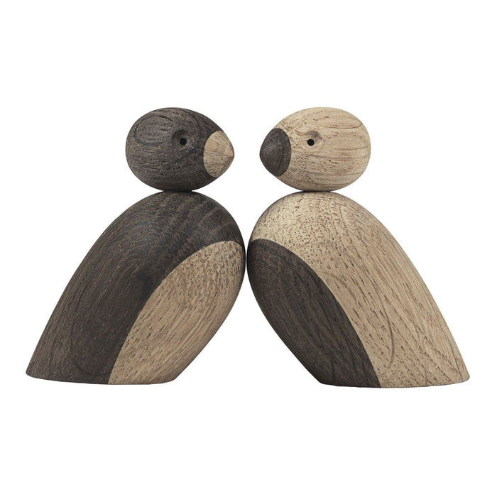Wooden birds in natural tones: dark brown and light beige, showcasing a smooth, minimalistic design. Perfect for decor.