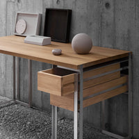 Modern wooden desk with a warm brown finish, silver accents, and a minimalist design, featuring a subtle drawer detail.