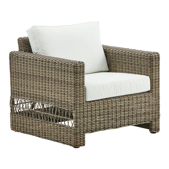 Light brown woven chair with white cushion, featuring a textured pattern and natural, rustic appeal.