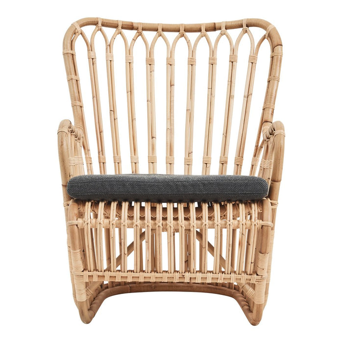 "Bamboo chair with natural finish and dark gray cushion. Stylish, modern design featuring intricate vertical lines."
