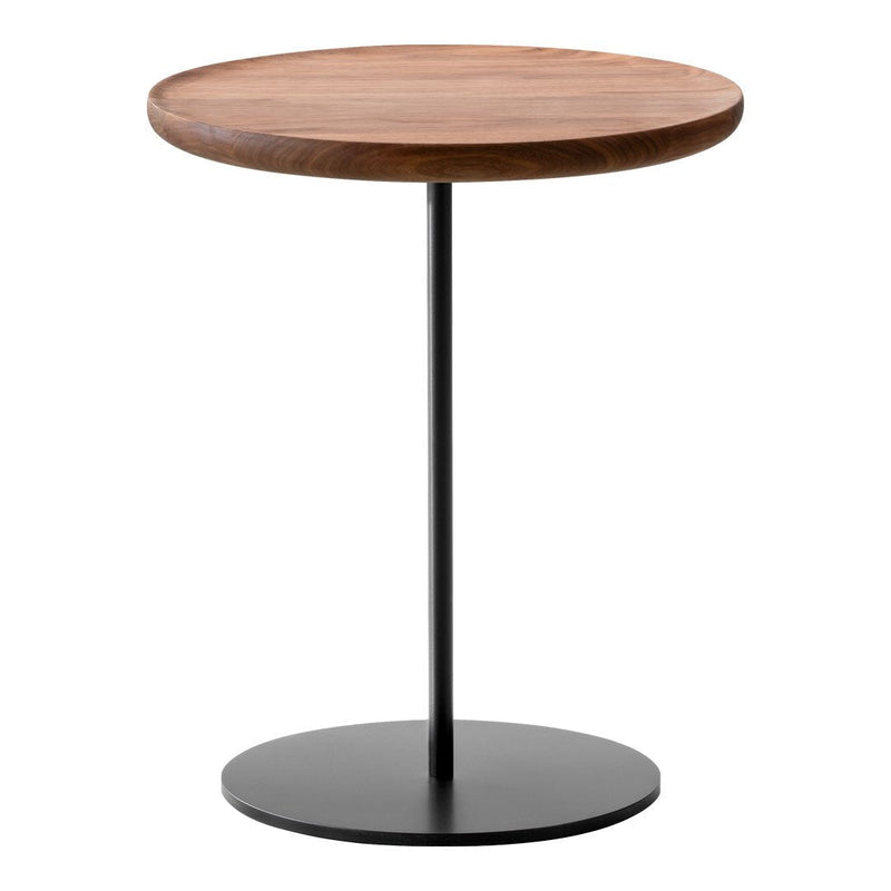 Round wooden tabletop in warm brown finish, supported by a sleek black metal base. Elegant and modern design.
