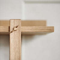 Light oak wood shelf with minimalistic design and soft natural tones, featuring a smooth, matte texture.