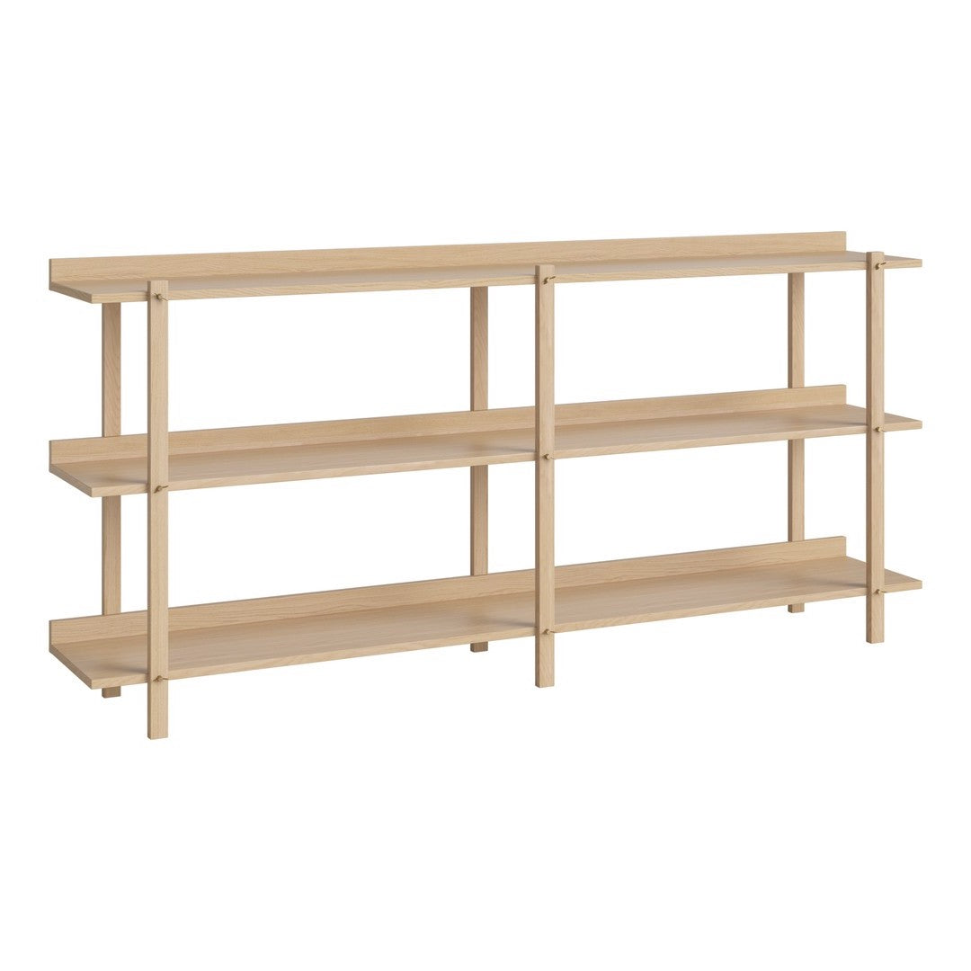 Light wood shelving unit with a minimalist design and smooth, natural finish on four open shelves.