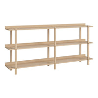 Light wood shelving unit with a minimalist design and smooth, natural finish on four open shelves.