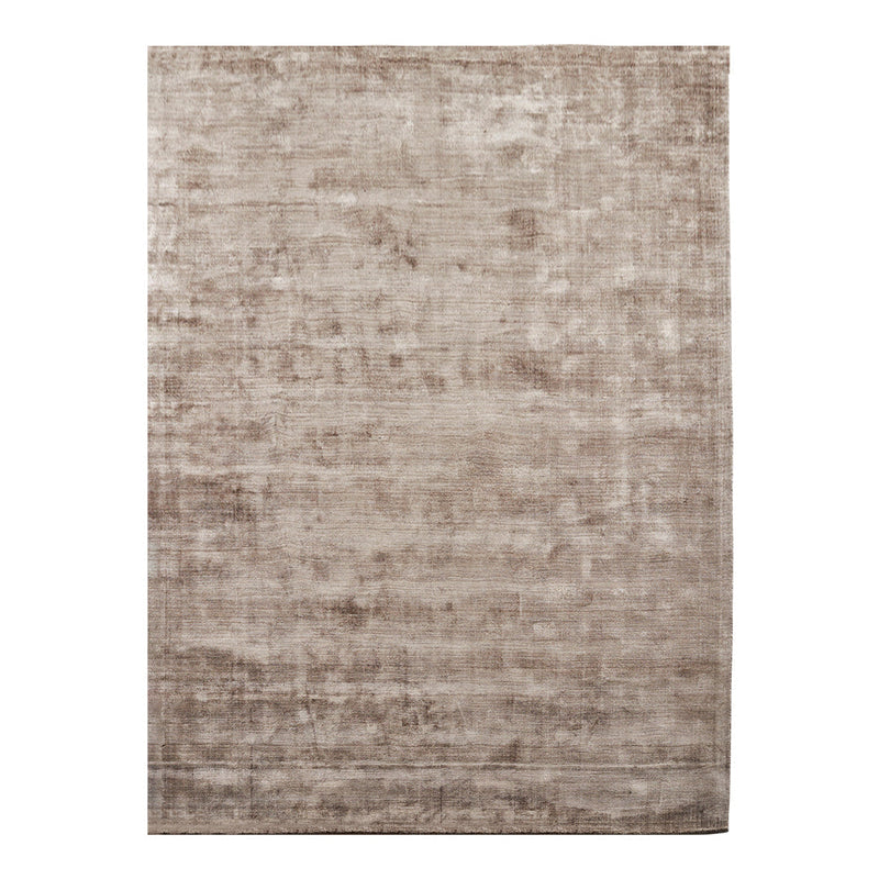 Soft beige area rug with a subtle textured pattern, perfect for adding warmth to any room decor.