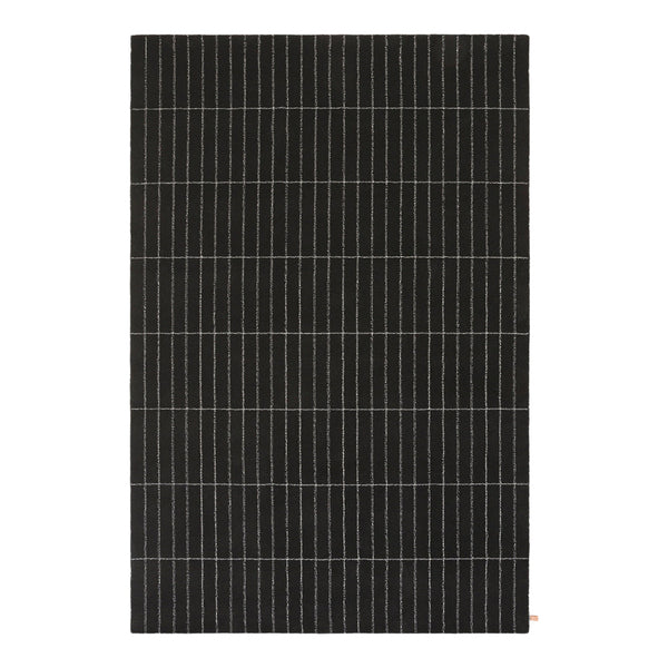 Black solar panel with grid pattern and thin white lines.