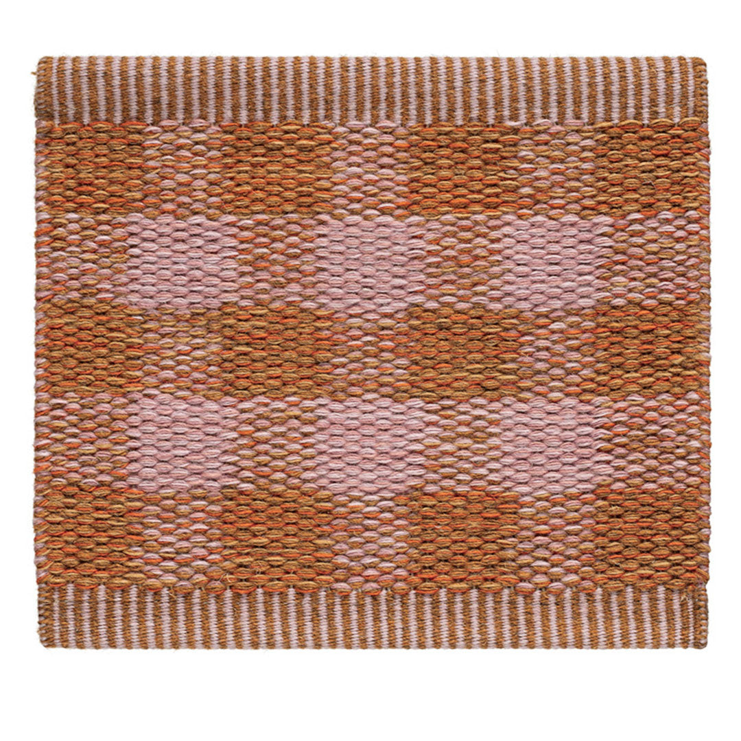 "Orange and pink checkered pattern rug with textured weaves and contrasting borders."