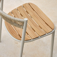 Natural wood slats in a light honey finish with a sleek white frame and woven pattern detail. Perfect for modern decor.