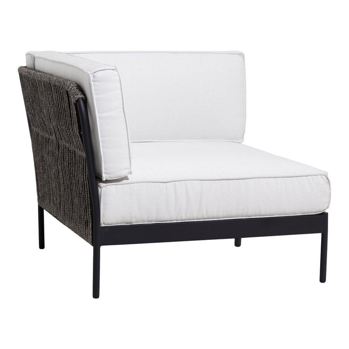 White cushioned chair with a dark woven backrest and sleek black metal frame. Modern, minimalist design.