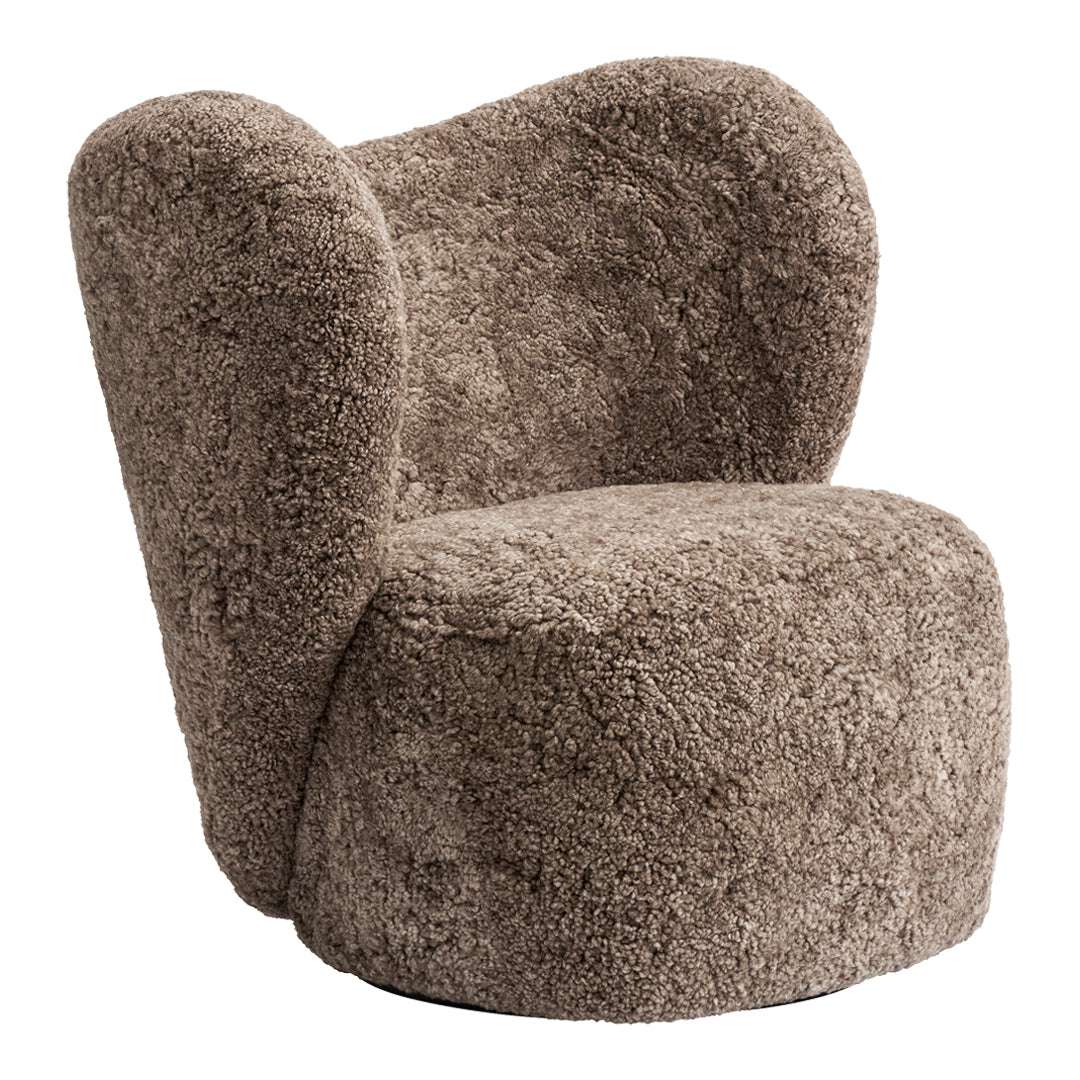 Plush, brown accent chair with a textured, fluffy pattern for a cozy and modern look.