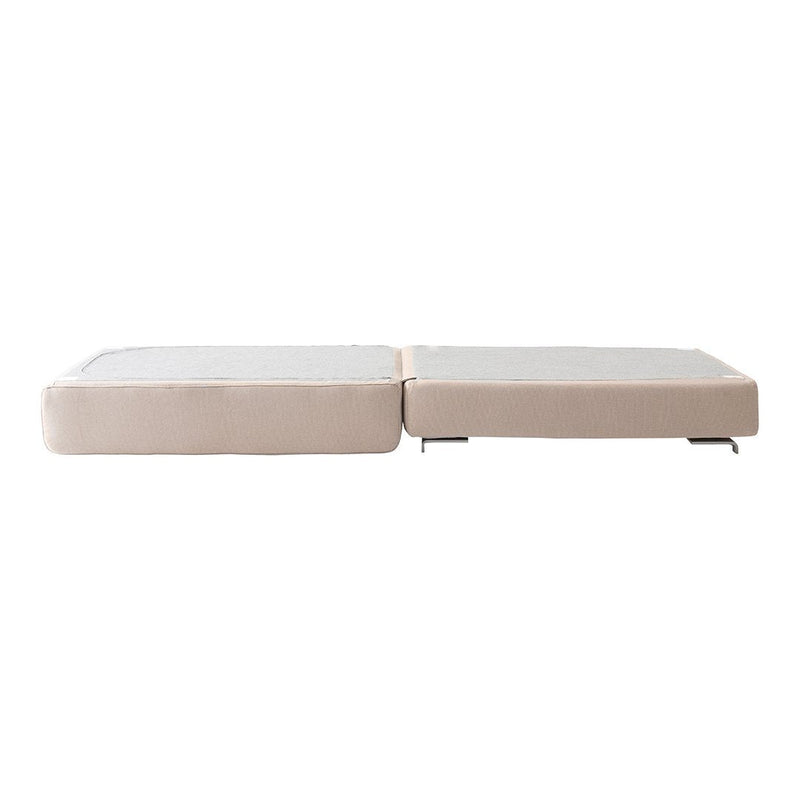 Light beige couch with a smooth texture, featuring a simple, modern design and clean lines.