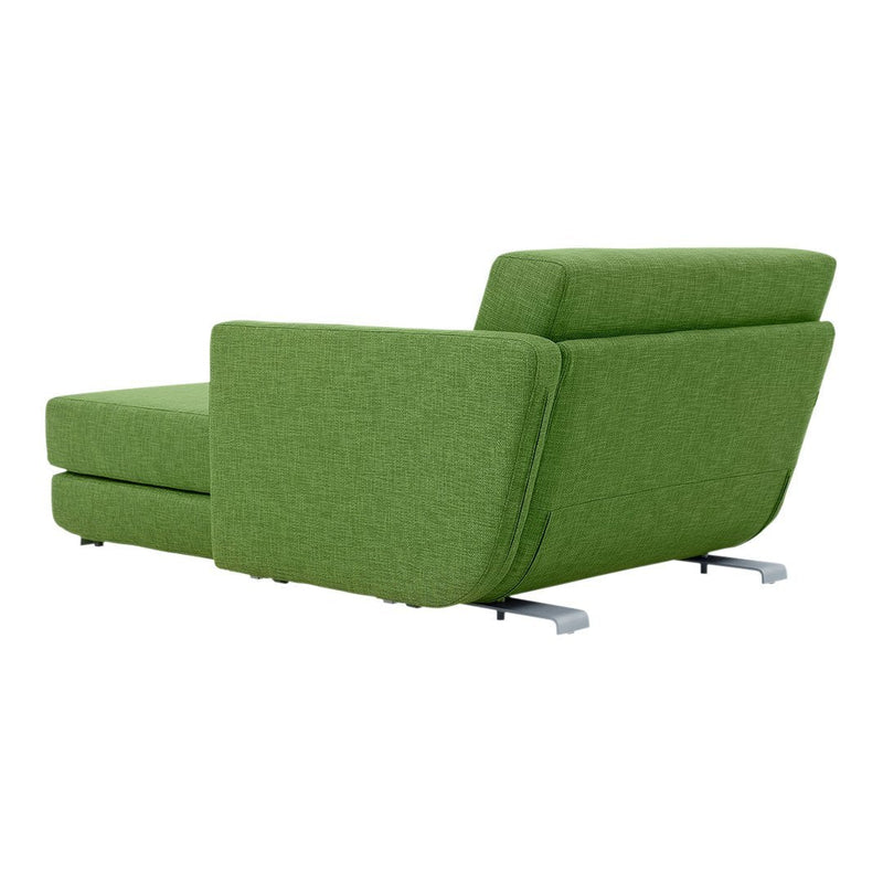 Vibrant green lounge chair with a textured fabric finish and sleek metal legs, perfect for modern decor.