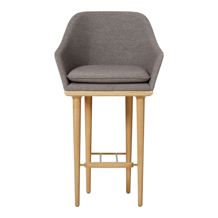 Gray upholstered bar stool with natural wood legs and a sleek, minimalist design. Perfect for modern interiors.