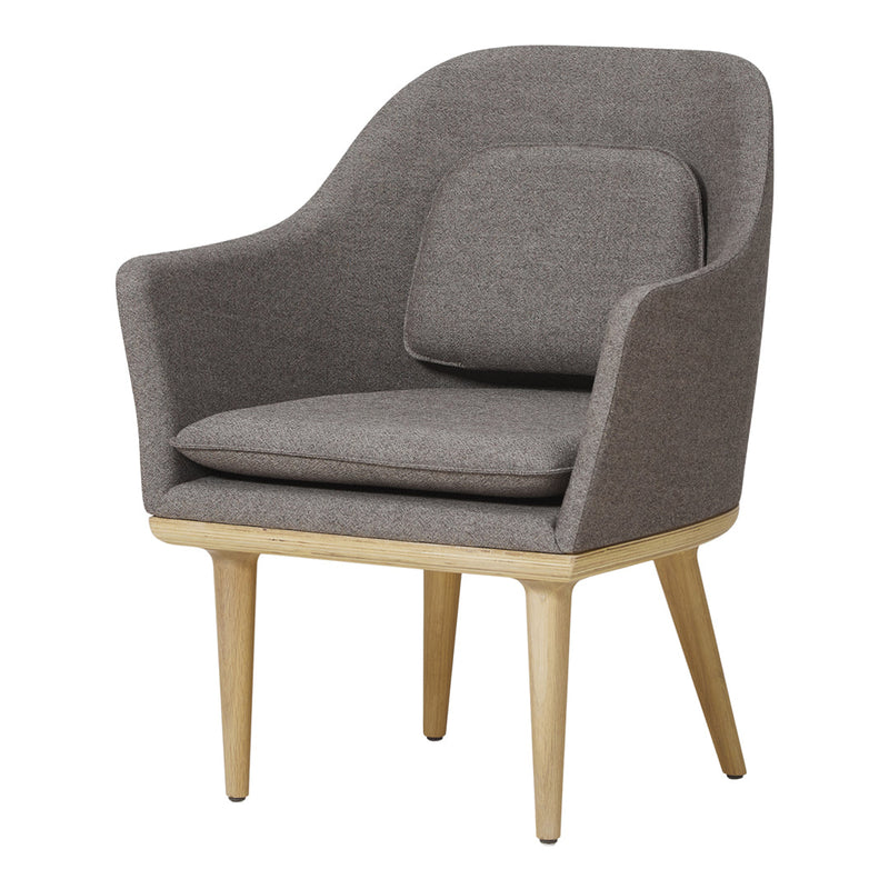 Gray upholstered armchair with a smooth, modern shape and natural wood legs, featuring a minimalist design.