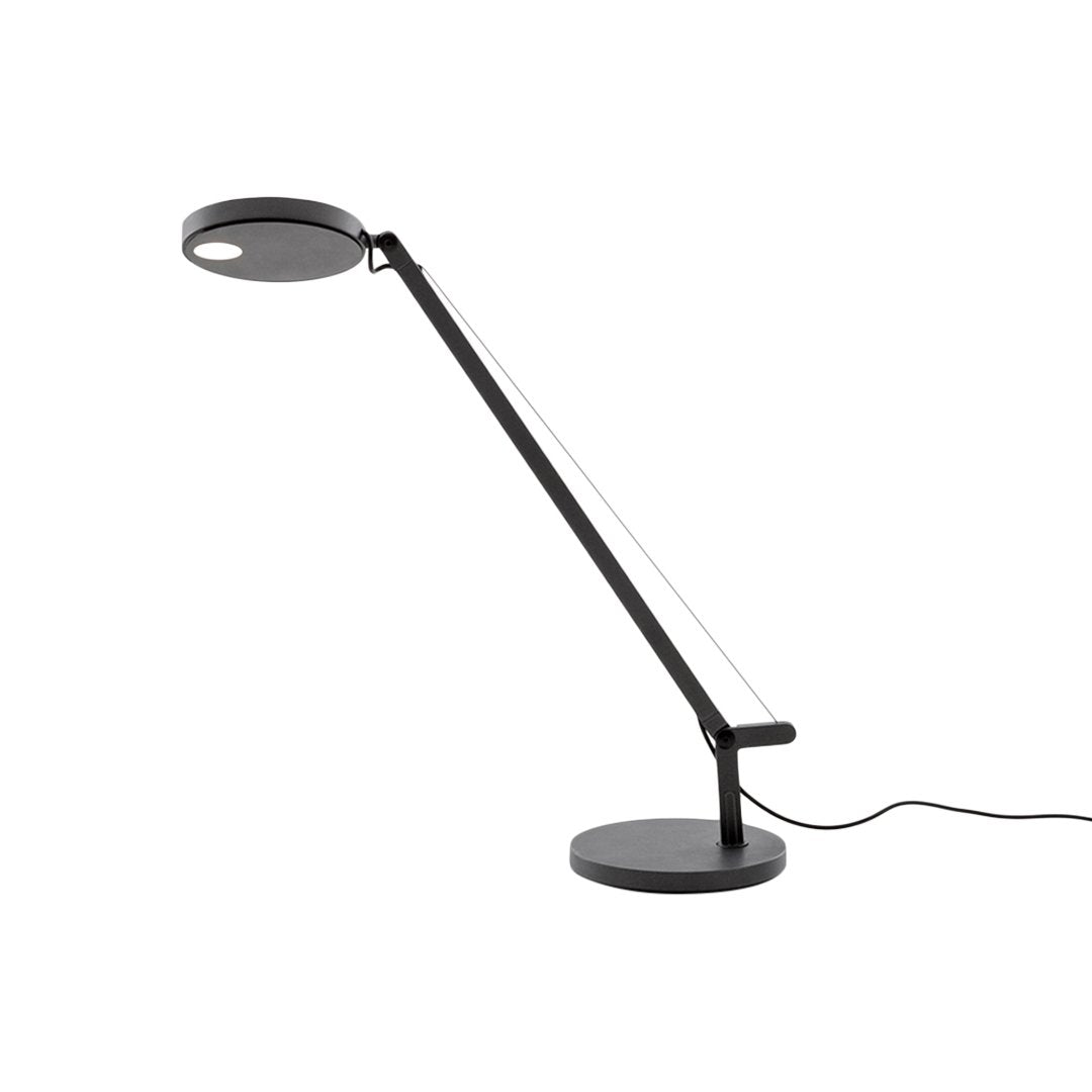 "Modern black desk lamp with a sleek, minimalist design and smooth, geometric patterns."