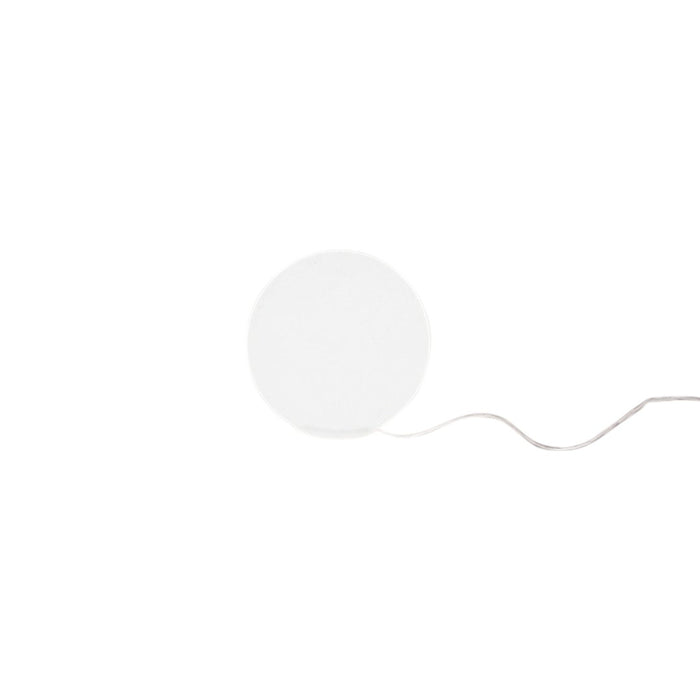 White circular pendant light with a smooth surface and a minimalist design, featuring a subtle hanging cord.