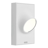 Modern white wall light fixture with a sleek, oval design and smooth surface, perfect for contemporary decor.