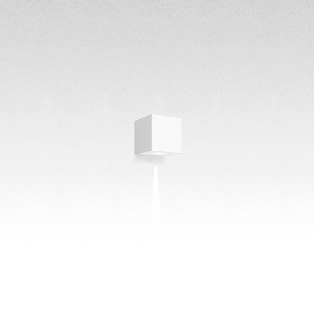 Minimalist white cube with a smooth, seamless texture, set against a soft gray gradient background.