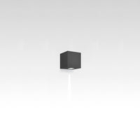 Black cube wall light with a sleek, modern design and minimalist style, perfect for contemporary decor.