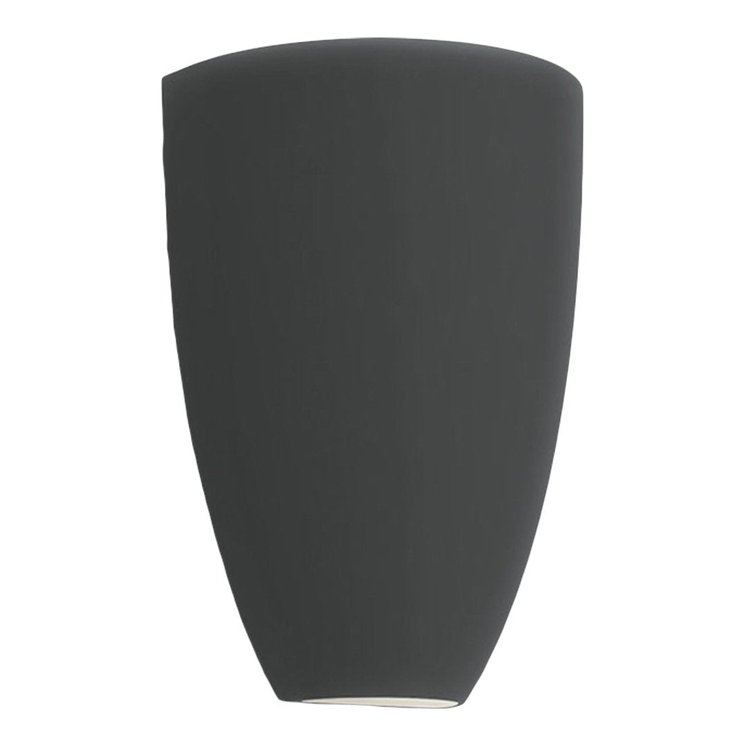 Matte black wall sconce with a sleek, modern tapered shape and smooth surface for contemporary interiors.