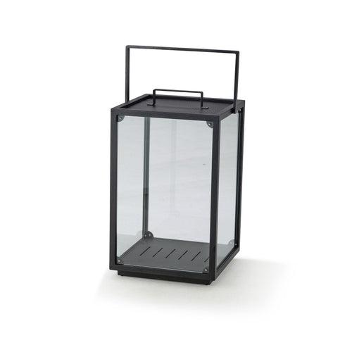 Black metal lantern with clear glass panels and linear interior slats, perfect for modern décor.