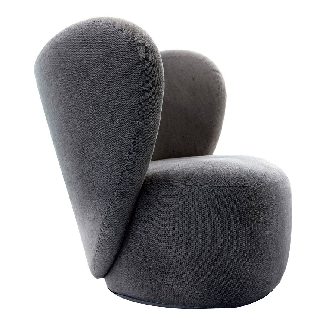 Modern gray chair with unique organic shapes and soft velvet texture, perfect for stylish interiors.