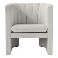 Textured gray chair with a modern striped pattern, showcasing a soft, cozy aesthetic perfect for contemporary decor.