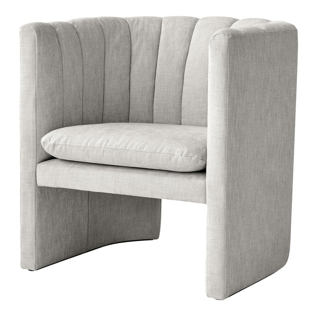 Light gray accent chair with plush upholstery and subtle vertical ribbed pattern. Modern design for stylish interiors.