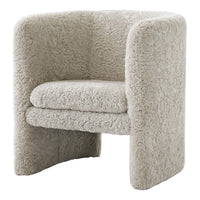 Cozy light beige accent chair with a soft, textured, and fluffy surface, perfect for modern interiors.
