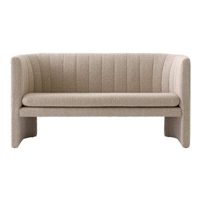 Beige upholstered sofa with vertical ribbed pattern and modern design. Ideal for minimalist and contemporary decor.